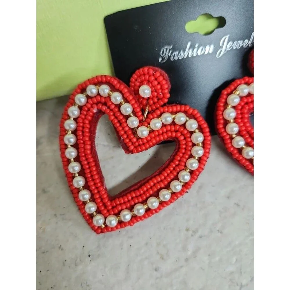 Love and  kisses red heart with pearl accent
